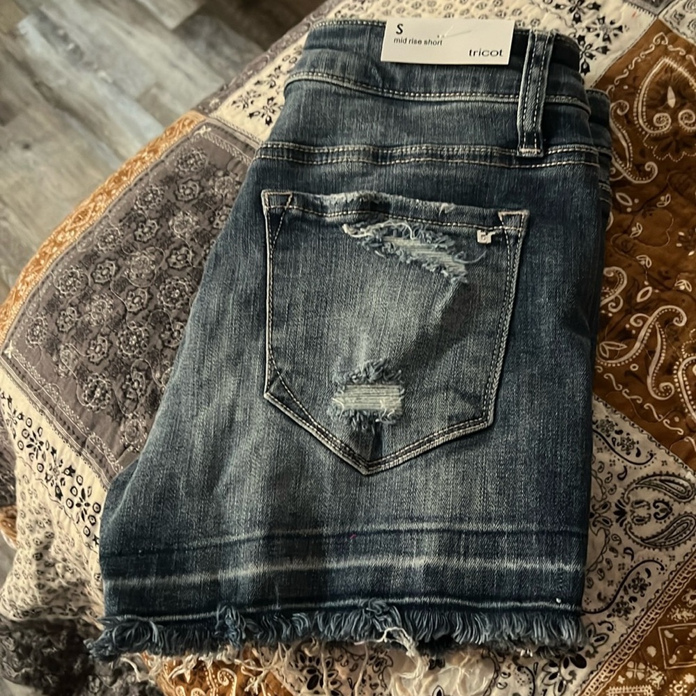 Distressed denim shorts